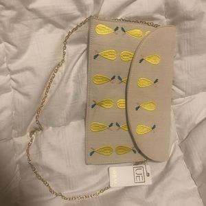 Urban expression pear clutch and crossbody